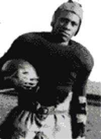{Paul Robeson 1898-1976 with a football}