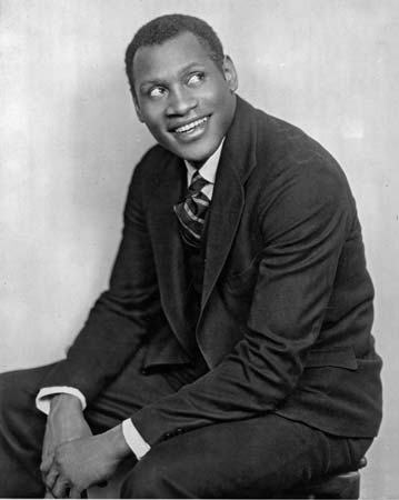 {Paul Robeson 1898-1976 with a football}